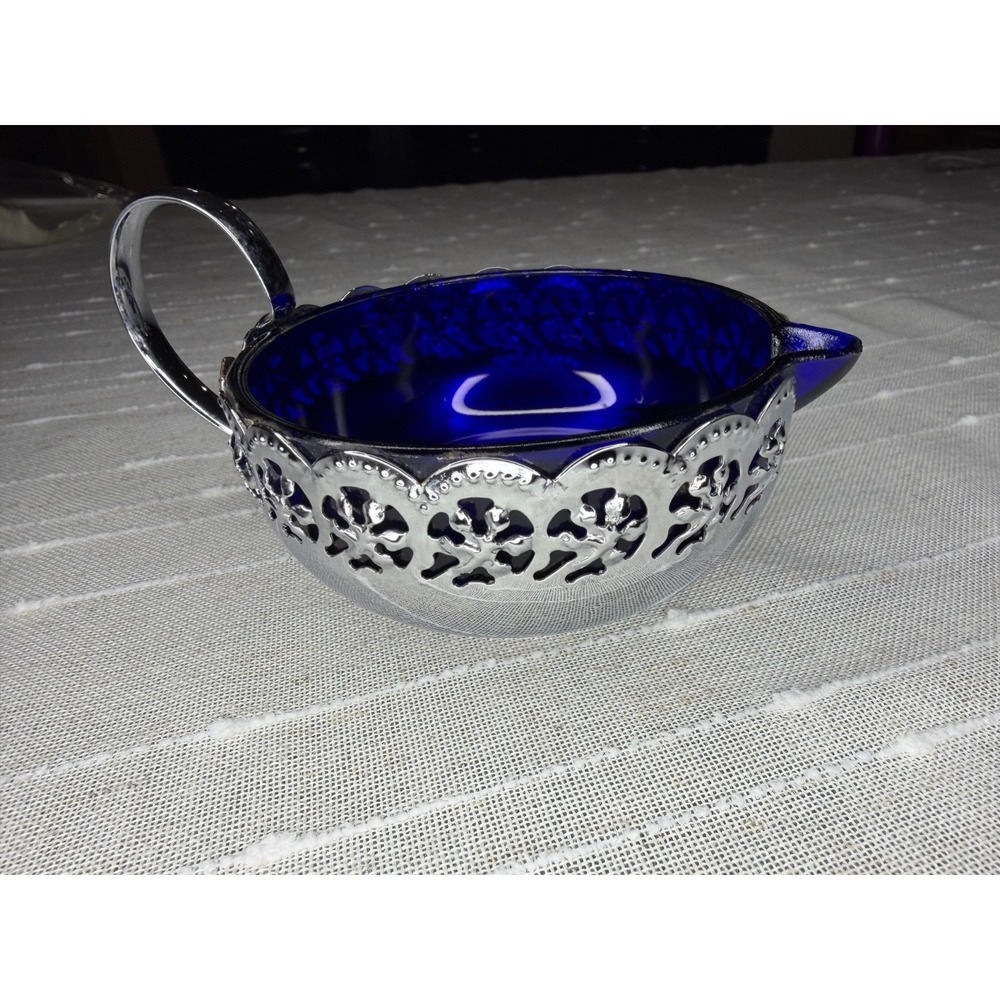 Vintage silver-plated creamer bowl with cobalt blue glass liners